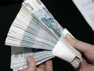 В РФ подделывают купюры достоинством в 1000 рублей и 100 долларов