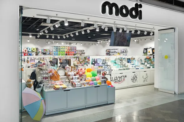 Ритейлер modi открыл первый магазин за границей
