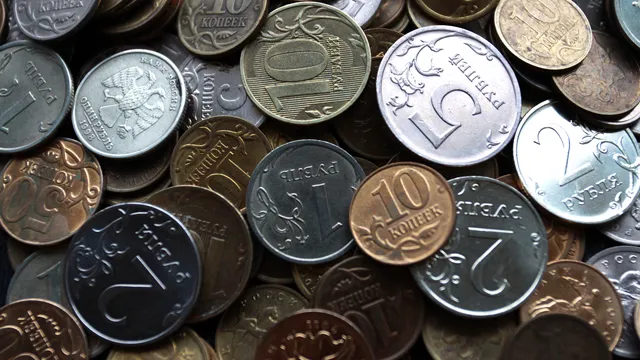 Монету с новым символом рубля ЦБ выпустит в 2014 году