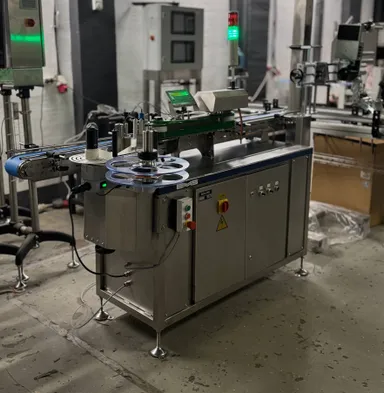 Автоматическая этикетировочная машина для круглых банок EMS Tech 